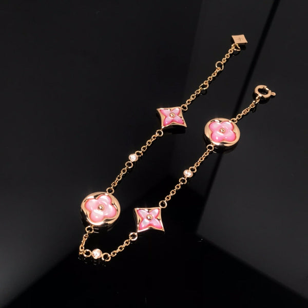 ˇGilded EraˇSTAR AND SUN 4 MOTIF PINK MOP PINK GOLD BRACELET