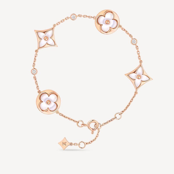 ˇGilded EraˇSTAR AND SUN 4 MOTIF WHITE MOP PINK GOLD BRACELET
