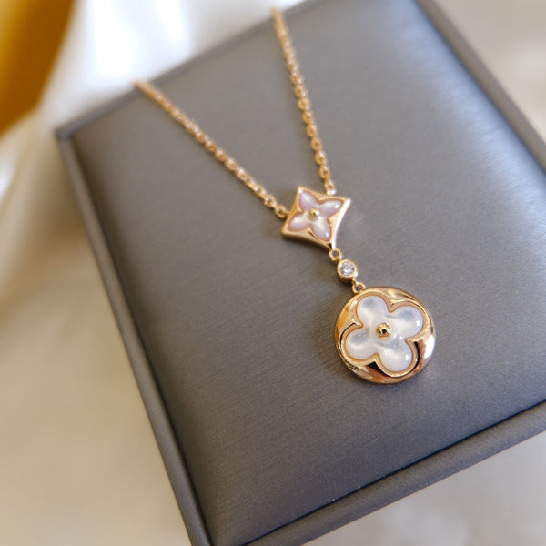 ˇGilded EraˇSTAR AND SUN WHITE MOP 2 MOTIF PINK GOLD NECKLACE