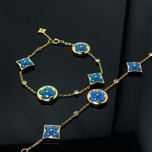 ˇGilded EraˇSTAR AND SUN 4 MOTIF BLUE BRACELET